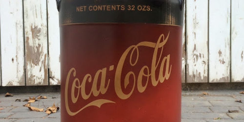 Lechera pintada de Coca-Cola