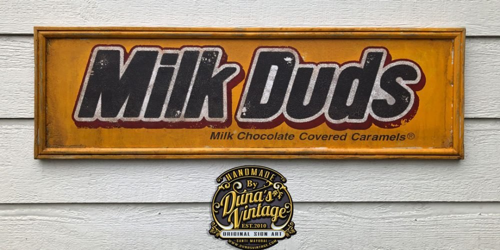 Cartel de Madera Milk Duds Chocolate.