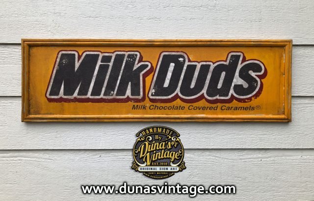 Cartel de Madera Milk Duds Chocolate.