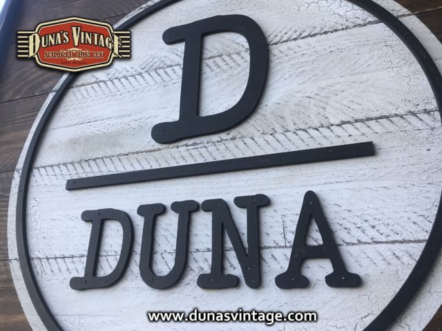 Cartel de Madera D de Duna.