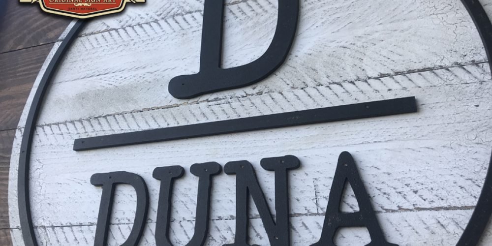 Cartel de Madera D de Duna.