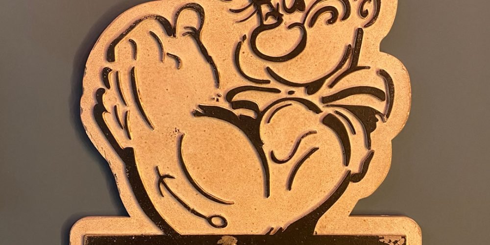 Placa de madera con relieve, FILSON Est. 1897 Popeye.