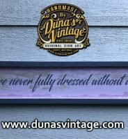Cartel de Madera You´re never fully dressed without a smile.