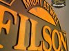 Cartel de madera tipo placa, de la marca FILSON
